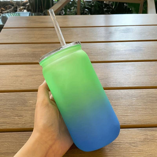 plastic drinks bottle with straw and lid