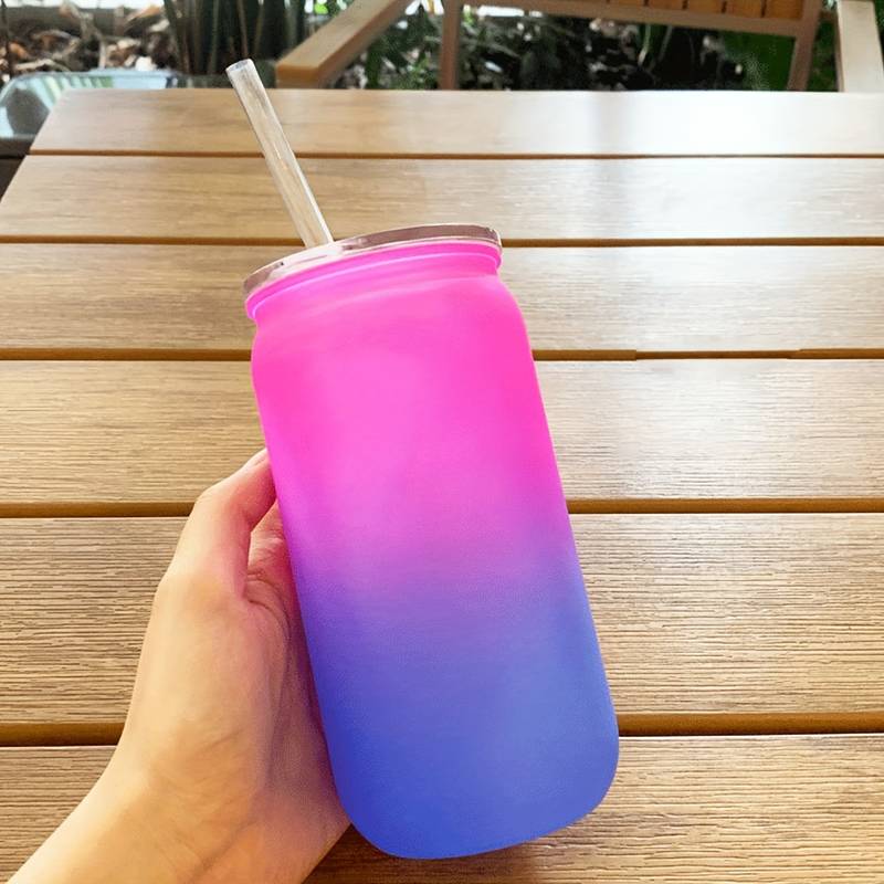 plastic drinks bottle with straw and lid