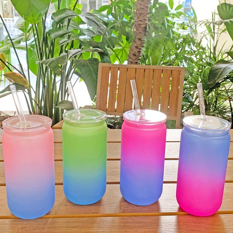 plastic drinks bottle with straw and lid